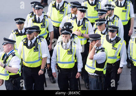 London, Britain. 27th May, 2017. Policemen are on patrol as security precautions are stepped up for Arsenal and Chelsea fans arriving at Wembley stadium for the FA Cup final in London, Britain, on May 27, 2017. The security level was in response to Manchester Arena bombing when 22 people died and 66 people were injured in one of the most deadly attacks in the UK. Credit: Ray Tang/Xinhua/Alamy Live News Stock Photo