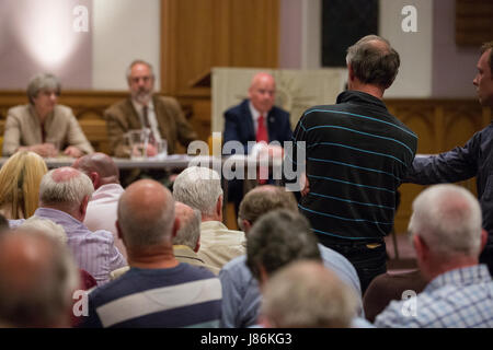 Maidenhead, UK. 27th May, 2017. A member of the audience asks a question about Heathrow expansion at a hustings event in the High Street Methodist Church for the Maidenhead constituency for the forthcoming general election. Credit: Mark Kerrison/Alamy Live News Stock Photo