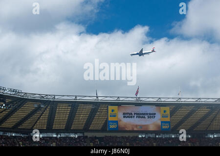 Twickenham, UK. 27th May, 2017. A jet coming into land at Heathrow above the Union flag at half-mast at the Wasps v Exeter Chiefs game Credit: On Sight Photographic/Alamy Live News Stock Photo