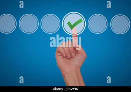 Young male hand touching, pressing modern button and ticking check box out of empty boxes on digital screen interface. Isolated on blue. Business tech Stock Photo
