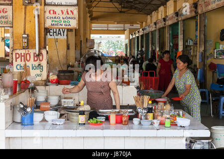 NHA TRANG, VIETNAM - JANUARY 20: Vietnamese style food court at the Xom Moi Market in Nha Trang on January 20, 2016 in Nha Trang, Vietnam. Stock Photo