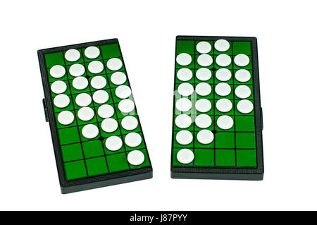 White Broken Heart Shaped Othellos on Separated Green Grid Othello Board Isolated Stock Photo