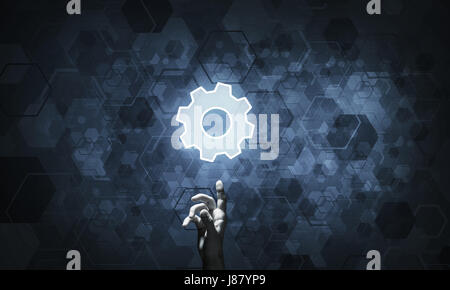 Technology conceptual image with gear digital symbol on dark bac Stock Photo