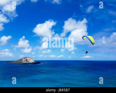 Scenic View of Parachuting with Background of Sea and Sky from Makapu'u Point Lookout Stock Photo