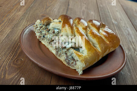 Kalakukko -  traditional food from the Finnish region of Savonia made from fish baked inside a loaf of bread. Stock Photo