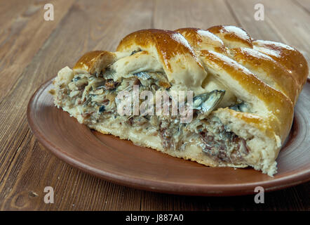 Kalakukko -  traditional food from the Finnish region of Savonia made from fish baked inside a loaf of bread. Stock Photo