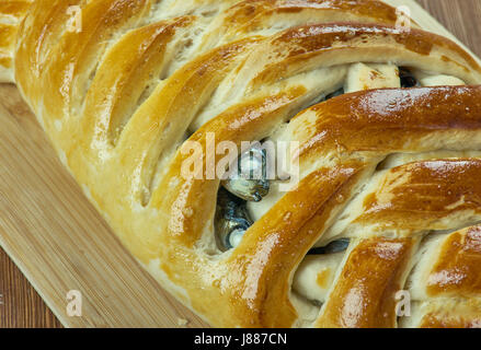 Kalakukko -  traditional food from the Finnish region of Savonia made from fish baked inside a loaf of bread. Stock Photo