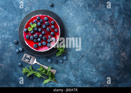 Delicious blueberry cake with fresh berries and marmalade, tasty cheesecake Stock Photo