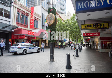 Perth,WA,Australia-November 16,2016: People, police car and retail shops in the Hay Street Mall in downtown Perth, Western Australia Stock Photo