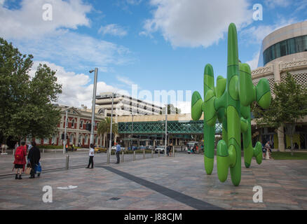 Perth,WA,Australia-November 16,2016: People in Forrest Place shopping district with buildings, and green 'Cactus' sculpture in Perth,Western Australia Stock Photo