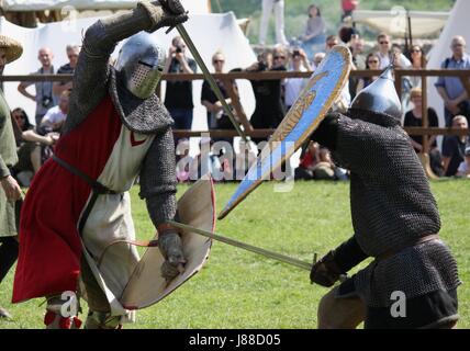 Knights fighting on tournament in the Czersk castle, south of Warsaw, Poland Stock Photo