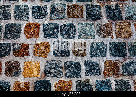 Running water over square stone paving Stock Photo