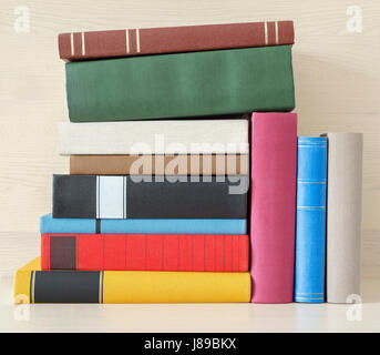 stack of books in the bookself Stock Photo