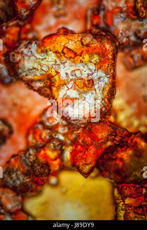 Colorful salt grains under microscope. Extreme salt closeup. Microscopic mineral detail. Stock Photo