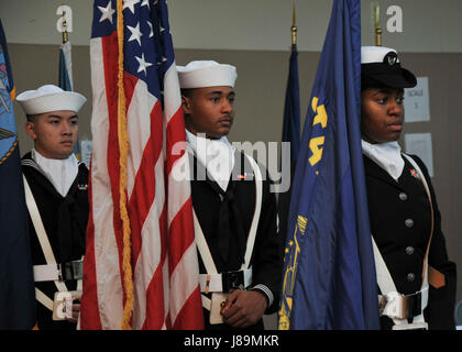 PORTLAND, Ore. (May 22, 2017) - Sailors assigned to the submarine tender USS Frank Cable (AS 40), participate in the change of command ceremony at the Naval Operational Support Center Portland, May 22. Capt. Jeff Farah relieved Capt. Drew St. John as commanding officer during the ceremony. (U.S. Navy photo by Mass Communication Specialist Seaman Heather C. Wamsley/Released) Stock Photo