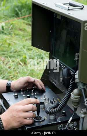 Soldiers of the 753rd Explosive Ordnance Disposal (EOD) of Kingwood, W.Va., and members of the West Virginia State Police Bomb Squad participated in a Raven's Challenge that took place at Camp Dawson, Kingwood, from May 21-26, 2017. Raven's Challenge is an annual, interagency, counter IED exercise that incorporates scenario focused on interoperability capabilities between public safety bomb squads and military EOD units in operational domestic type IED environments. The exercise also provided international participation. (U.S. Army photo by Sgt. Penni Harris) Stock Photo