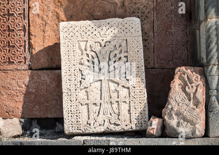 Armenian khachkar - hand carved stones, traditional Armenian Christian art. Stock Photo