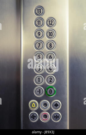 Different buttons in modern metal elevator Stock Photo