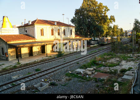 Disused and neglected Train station Stock Photo