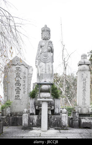 Kyoto, Japan - November 2016: Statue of Kannon (Guanyin) or Goddess of Mercy, an East Asian bodhisattva, situated at Enkoji temple in Kyoto, Japan Stock Photo