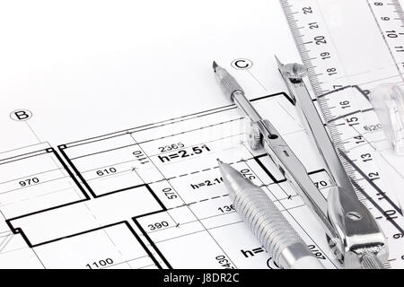 ruler, pen and drawing compass on architectural drawing of modern house Stock Photo