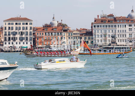 Venice, Veneto, Italy. 28th May, 2017. The historic ceremonial boat The Serenissima carrying the dignatories during the annual Fete de la Sensa during which the Patriach blesses a gold ring which is tossed into the lagoon marrying Venice to the sea. Stock Photo