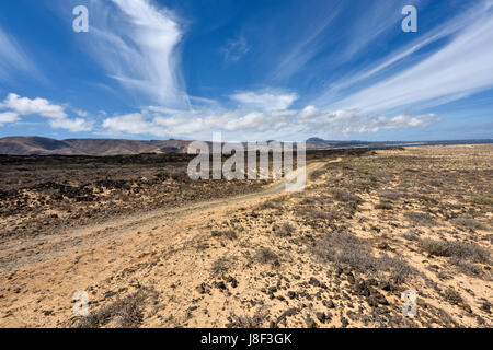 Road through the fantastic coastal area of Lanzarotes Northwest. Lanzarote, Spain Stock Photo