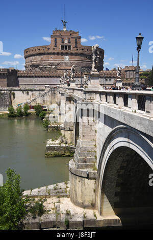 The Castel Saint Angelo, Rome, Italy connects with St Peters at the Vatican  and over looks the Bridge of Angels. Stock Photo