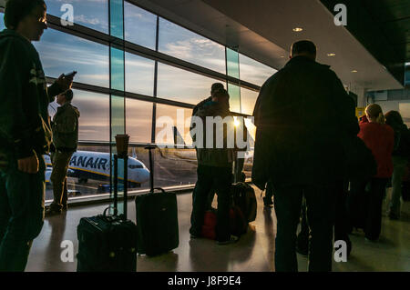 Early morning Dublin airport Ryanair boarding queue Stock Photo