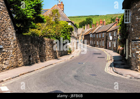 A quaint charming archetypical Dorset street with delightful cottage architecture, some dating back to the 17th century, set in striking countryside Stock Photo