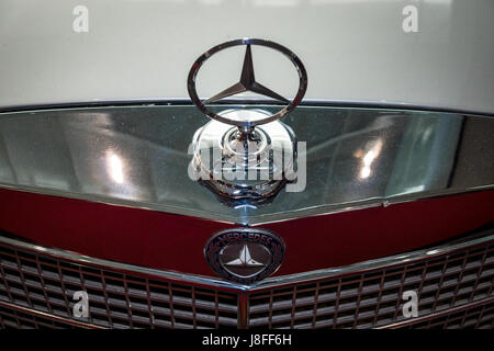 Hood ornament of Mercedes-Benz (three-beam star), closeup. Europe's greatest classic car exhibition 'RETRO CLASSICS' Stock Photo