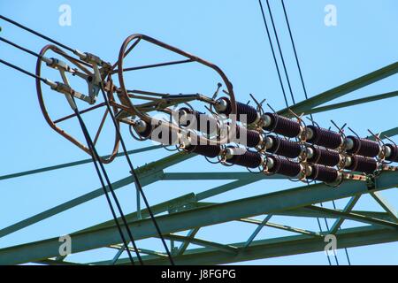 Detail of high-voltage ceramic insulator. High Voltage Lead. Electricity distribution Stock Photo