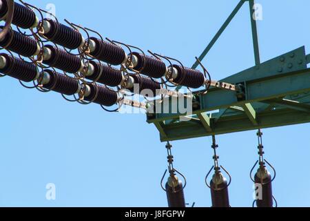Detail of high-voltage ceramic insulator. High Voltage Lead. Electricity distribution Stock Photo