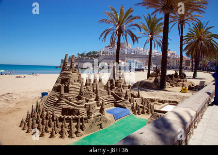 Sand sculpture of Dracula’s Castle by Romanian artist Aldescu Ion on Peniscola beach in Castellon, Spain Stock Photo