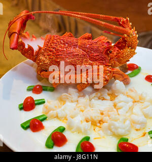 Cantonese cuisine Steamed Australian lobster in Egg white Stock Photo