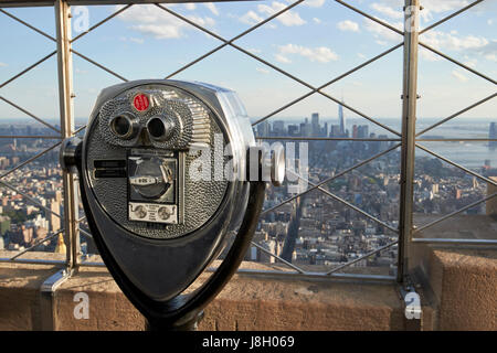 tower viewer pay per view binoculars at the top of the empire state building New York City USA