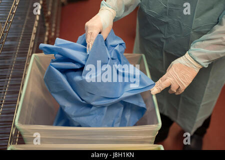 Surgical instruments being cleaned and sterilised at a hospital by a surgical instrument sterilising company Stock Photo