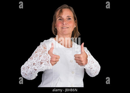 Attractive authentic european lady with white shirt showing thum Stock Photo