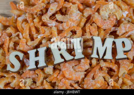 dried shrimp,select focus on Wood Background Stock Photo