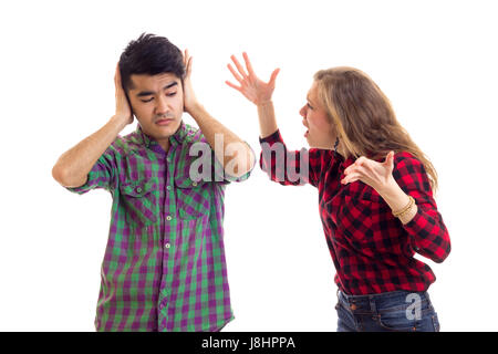 Young couple in plaid shirts arguing  Stock Photo