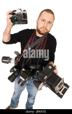Professional male photographer with modern cameras choosing photos on ...