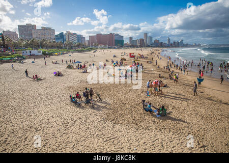 Durban, South Africa - 16 JANUARY 2015, A beautiful view of the beach where people are playing with the waves Stock Photo