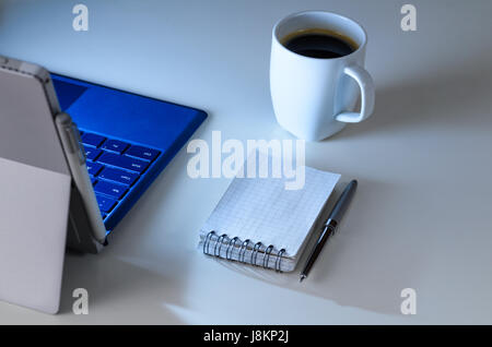 Evening work place and laptop Stock Photo