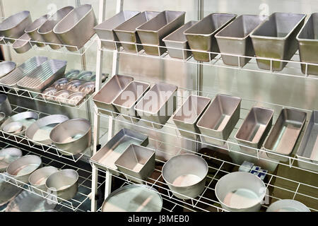 Metal forms for bread baking on market Stock Photo