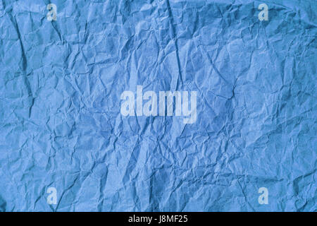 Background of old crumpled colored parchment paper Stock Photo