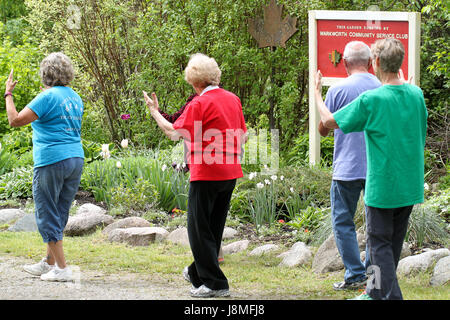 Warkworth Lilac Festival. Tai Chi demonstration along the Lilac Trail on the festival opening weekend. Stock Photo