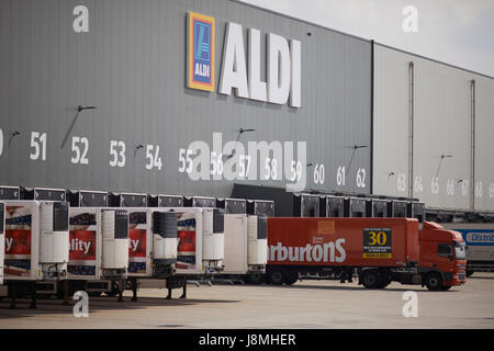 ALDI distribution centre delivery bays with HGV trucks in Bolton