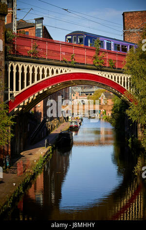 Sunny day, victorian cast iron railway bridges  Castlefield on the Rochdale Canal, Gtr Manchester, UK. Stock Photo
