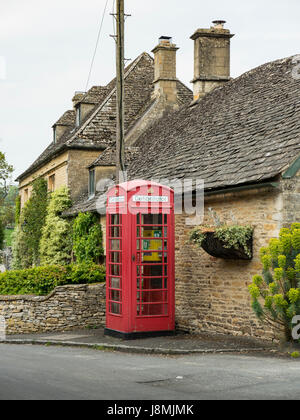 British telephone booth in Upper Slaughter, England are transformed into life saving Automatic Electric Defibrillator stations as pay phones disappear Stock Photo