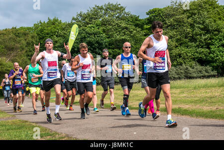 Runners in the Edinburgh Marathon Festival 2017 in Gosford Estate, East Lothian, Scotland, UK with charity runners for British Liver Trust Stock Photo